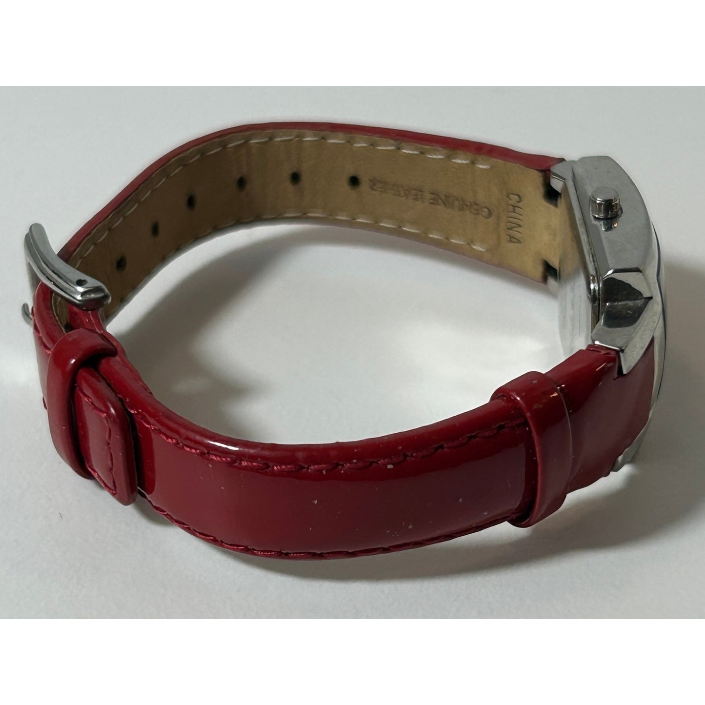 Kenneth Cole Reaction Women’s Red Leather Strap Square Watch – Silver Dial