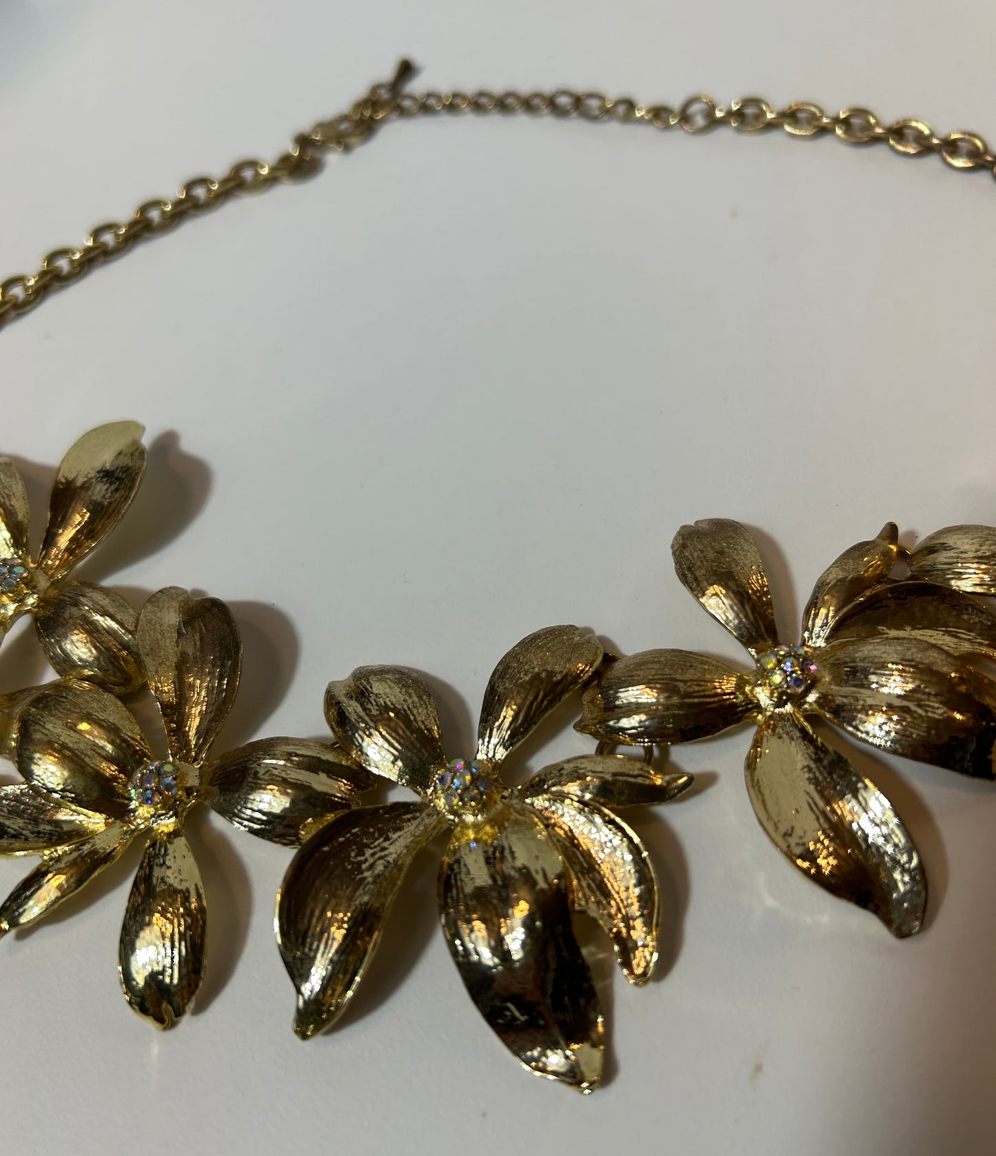 Vintage Gold-Tone Floral Statement Necklace with Textured Petals and Rhinestone Centers