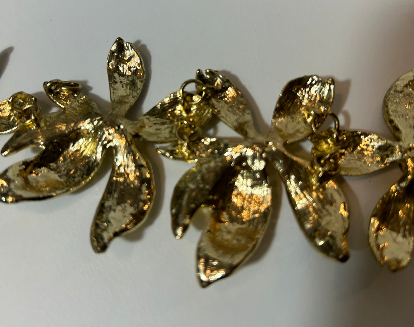 Vintage Gold-Tone Floral Statement Necklace with Textured Petals and Rhinestone Centers