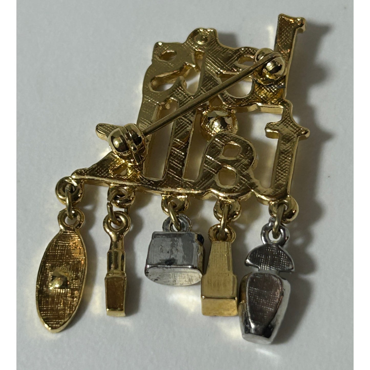 Vintage Avon "Let's Talk" Gold Tone Brooch with Makeup Charms, Rhinestone Accent