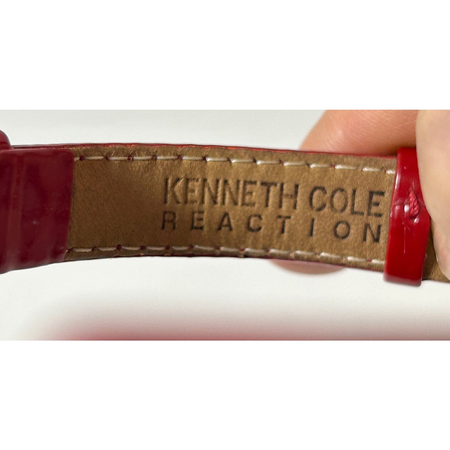 Kenneth Cole Reaction Women’s Red Leather Strap Square Watch – Silver Dial