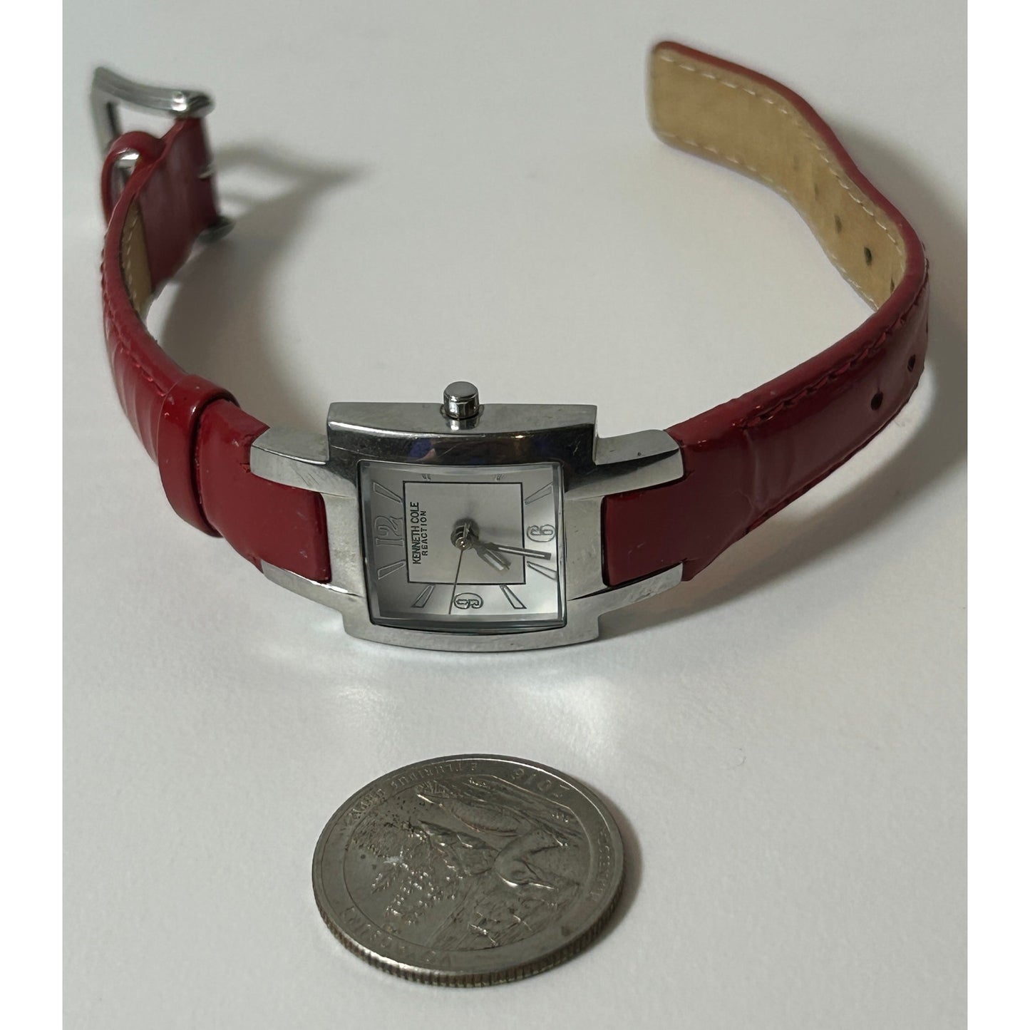 Kenneth Cole Reaction Women’s Red Leather Strap Square Watch – Silver Dial