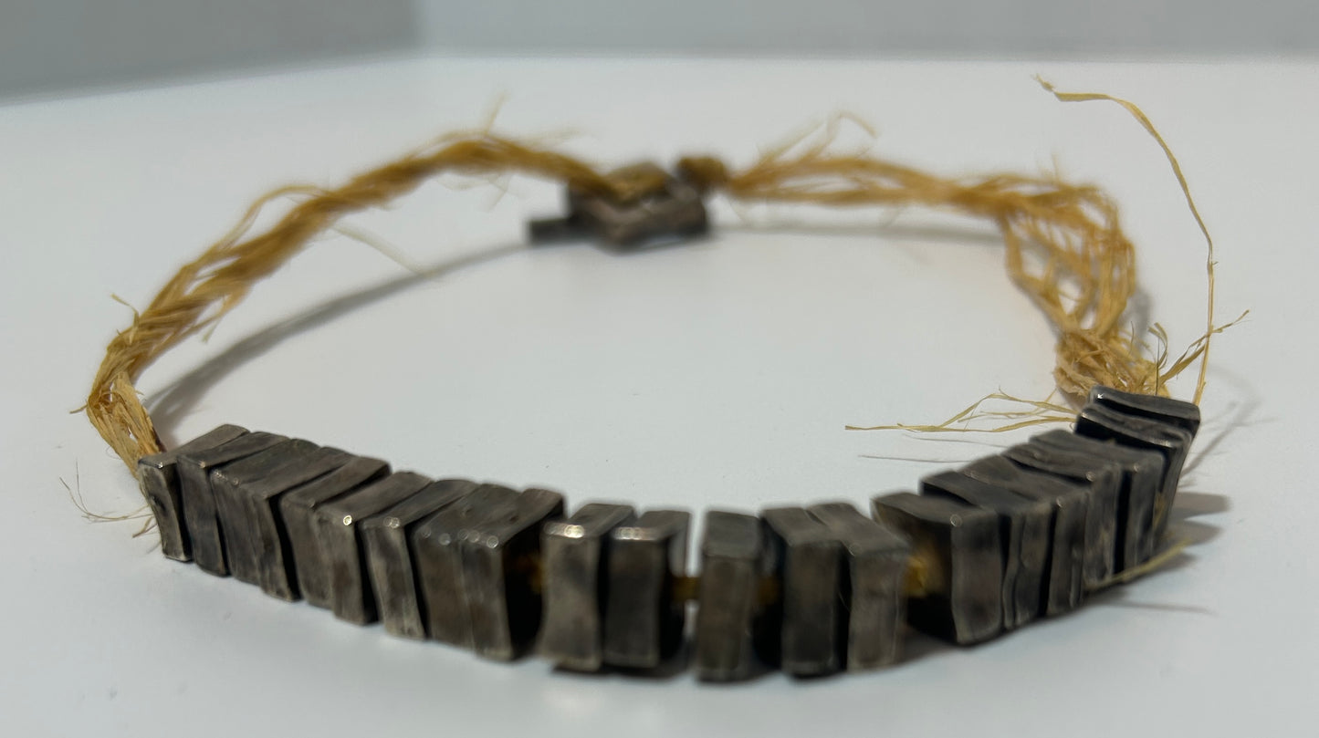 Rustic Artisan Necklace with Textured Metal Beads on Natural Raffia Cord – Statement Tribal Boho Jewelry