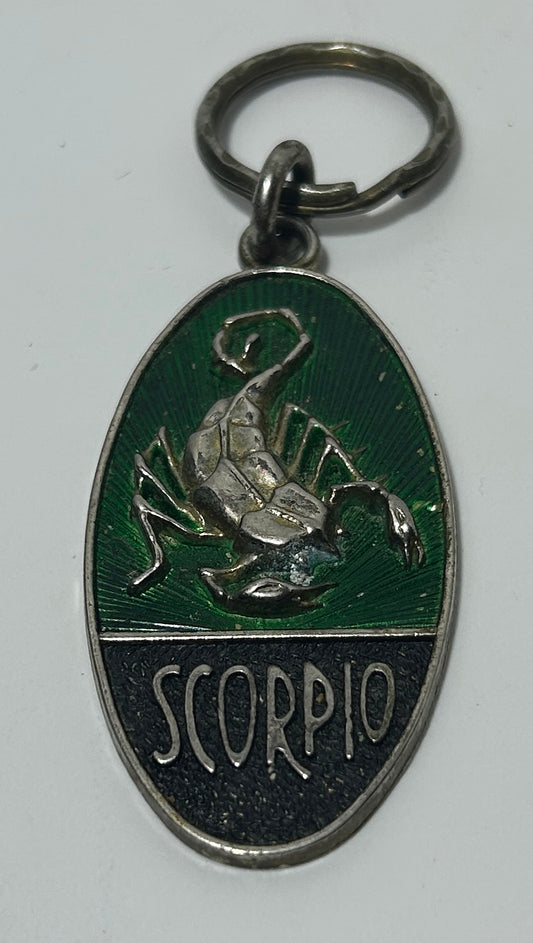 Vintage Scorpio Zodiac Keychain – Metal Oval Pendant with Raised Scorpion and Enamel Inlay (Circa 1970s)
