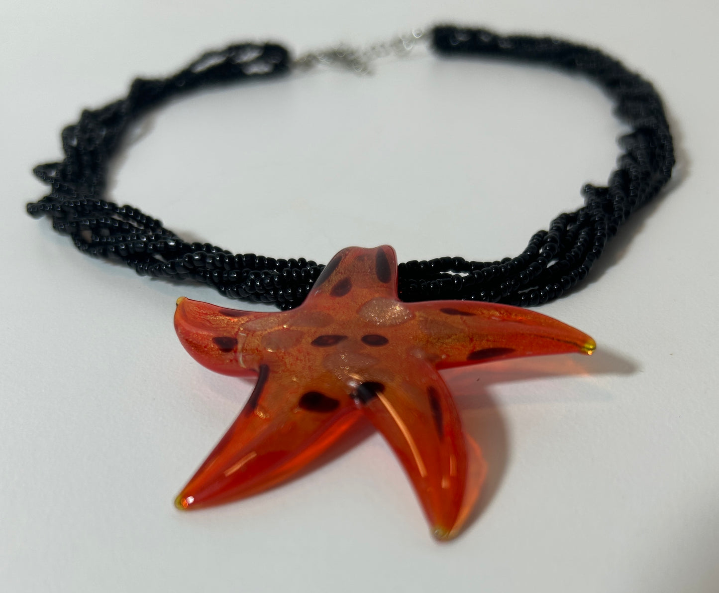 Handcrafted Murano-Style Glass Starfish Pendant Necklace with Black Seed Bead Strand – Coastal Statement Jewelry