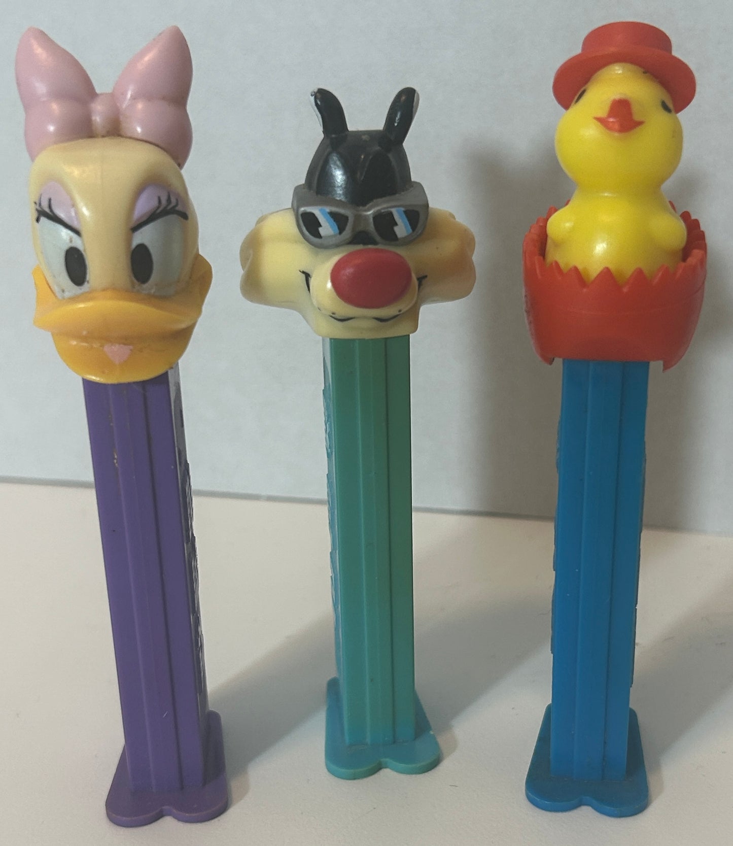 Set of 3 Vintage PEZ Dispensers – Daisy Duck, Sylvester, and Easter Chick