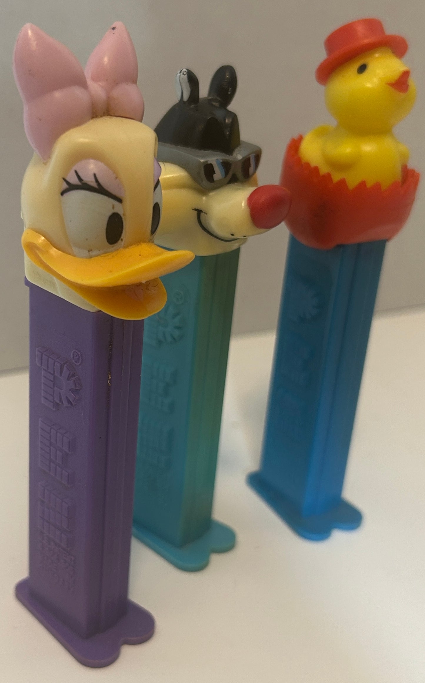 Set of 3 Vintage PEZ Dispensers – Daisy Duck, Sylvester, and Easter Chick