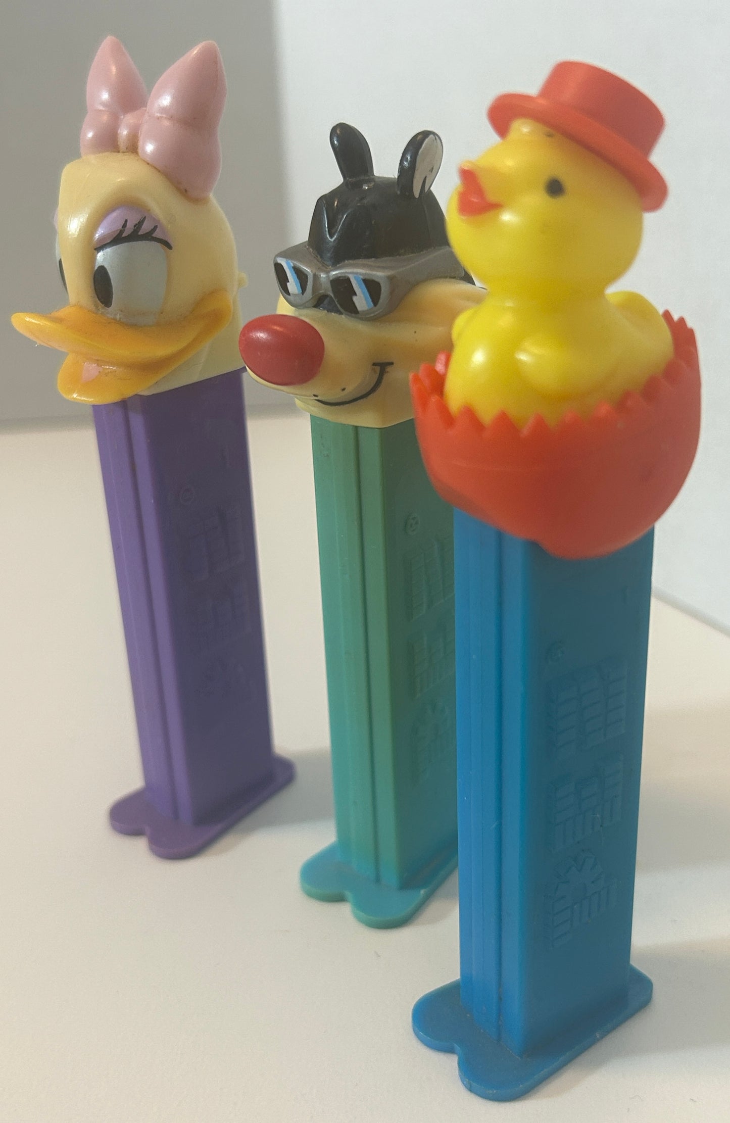 Set of 3 Vintage PEZ Dispensers – Daisy Duck, Sylvester, and Easter Chick