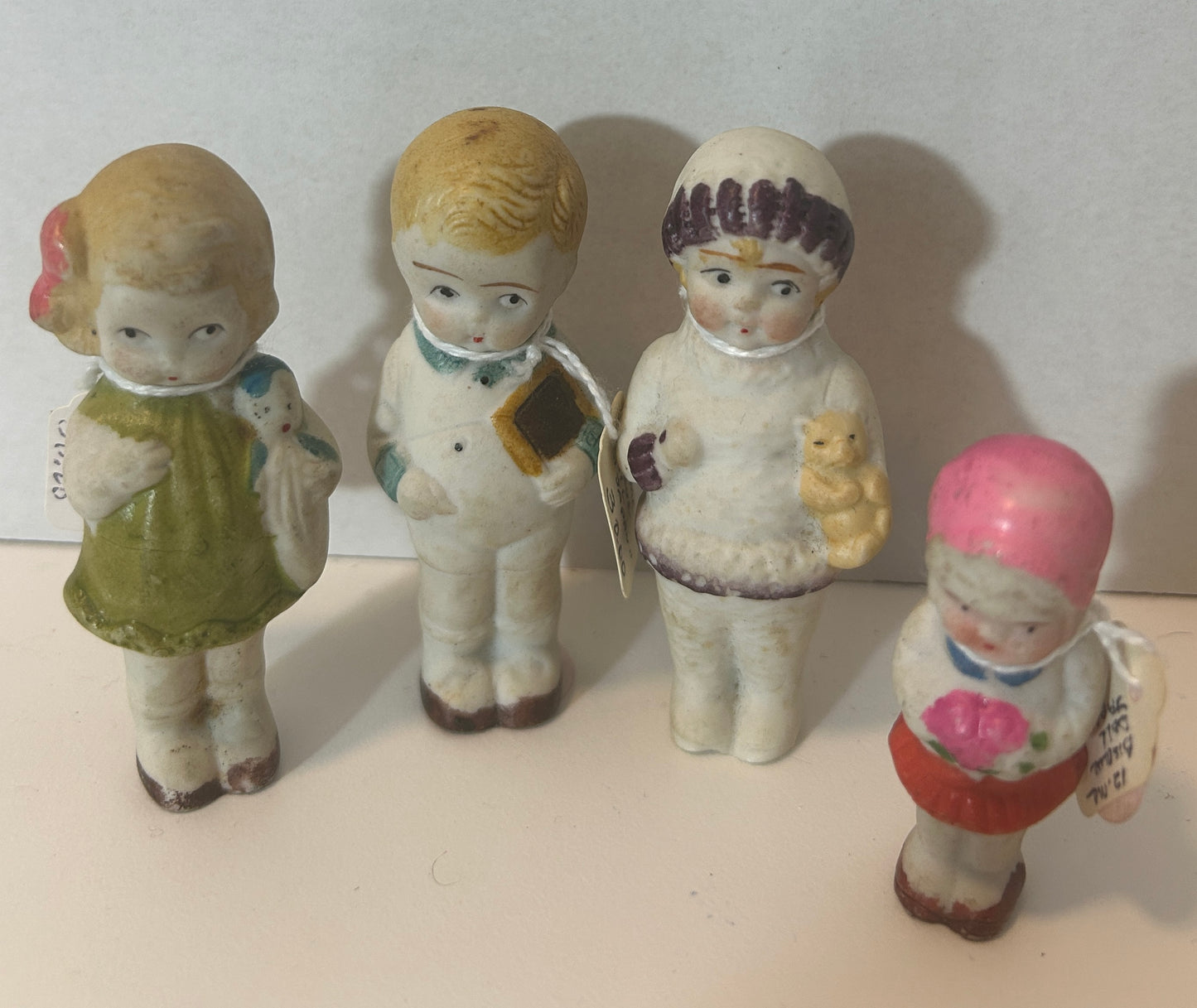 Set of 4 Antique Bisque Doll Figurines