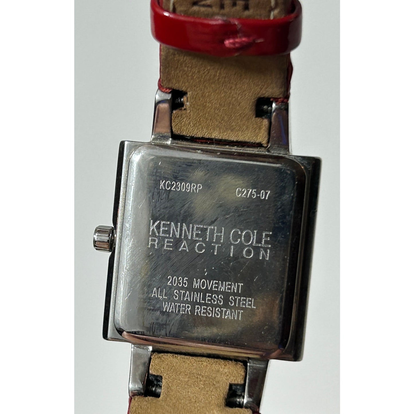 Kenneth Cole Reaction Women’s Red Leather Strap Square Watch – Silver Dial